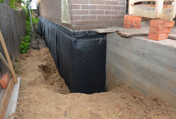Happy homeowners after waterproofing job in Pierceton